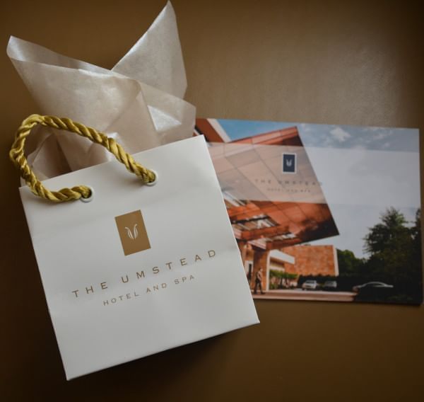 Gift bag featuring poster cards at The Umstead Hotel and Spa