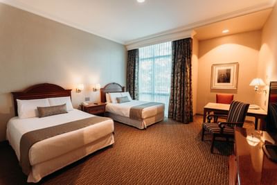 Beds & desk in Executive Room Double at Araiza Mexicali