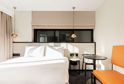 King bed & TV in business room at Brady Hotels Jones Lane