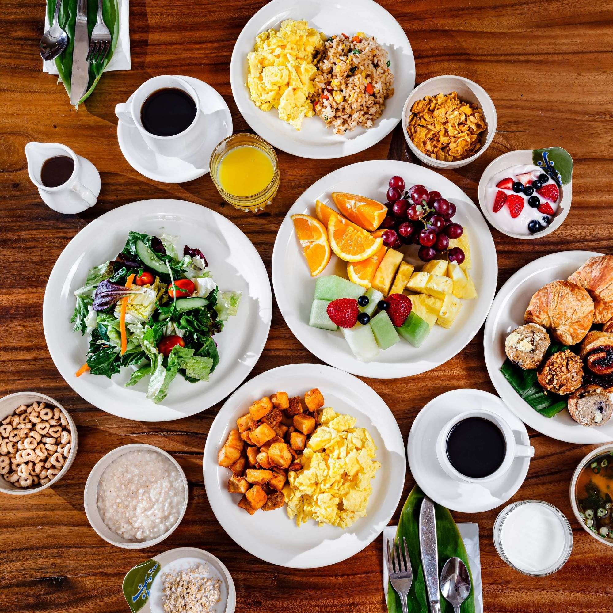 a table with various breakfast foods