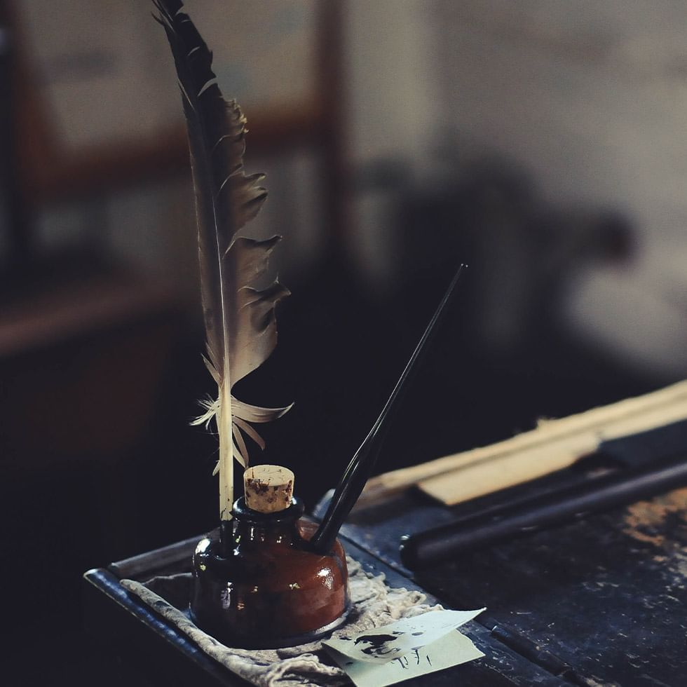 Ink bottle with a feather, School Museum, Falkensteiner Hotels