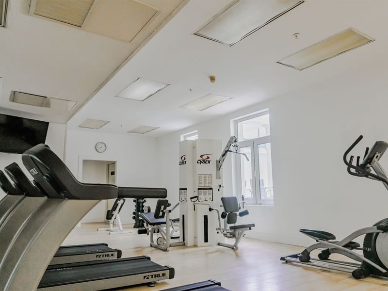 Exercise machines in the fitness center at Gamma Hotels
