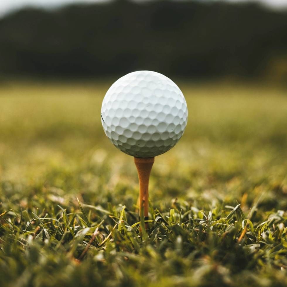 Close-up of golf ball on a tee at Falkensteiner Hotels