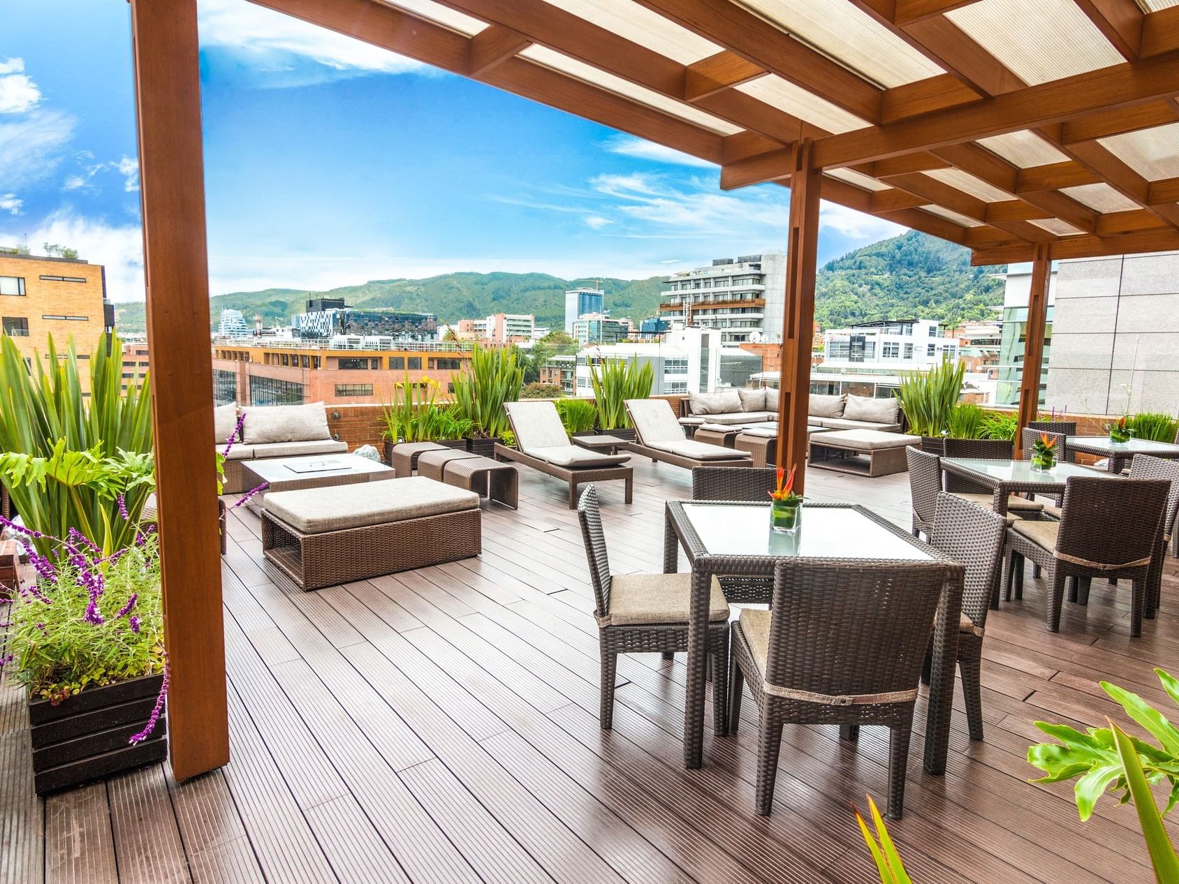 The outdoor terrace area with chairs and tables