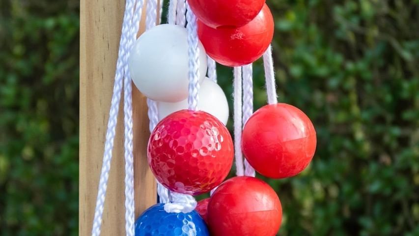 Close-up of ladder balls, hanging from a pole at Cove Pocono Resorts
