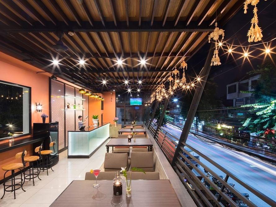 Lighted dining area in DRINK Bar at U Hotels & Resorts