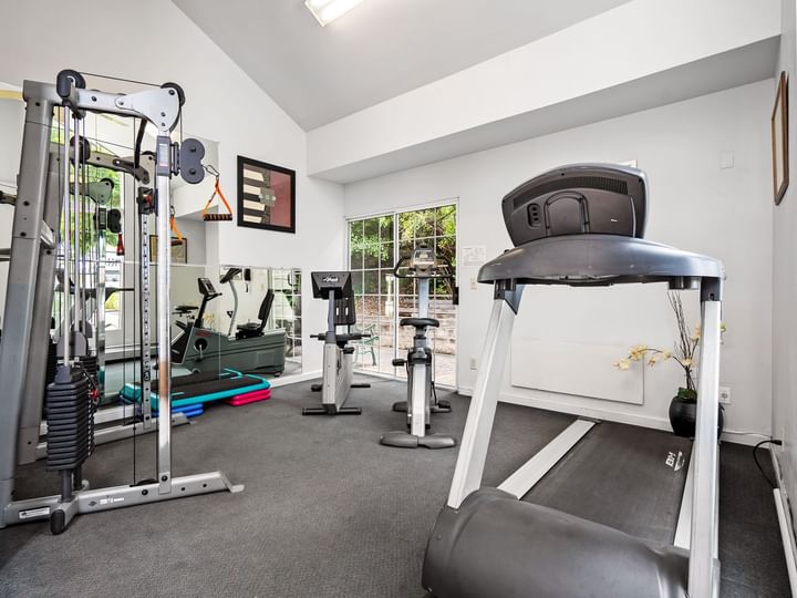 A well-equipped fitness center with various exercise machines