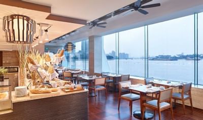 Interior of River café with a city view at White Swan hotel