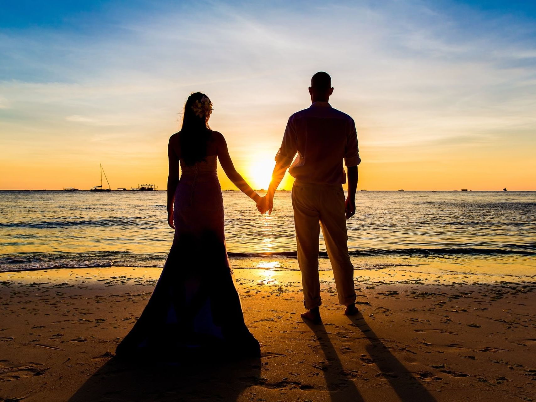 Wedding couple at the sunset near Cabo Villas Beach Resort 