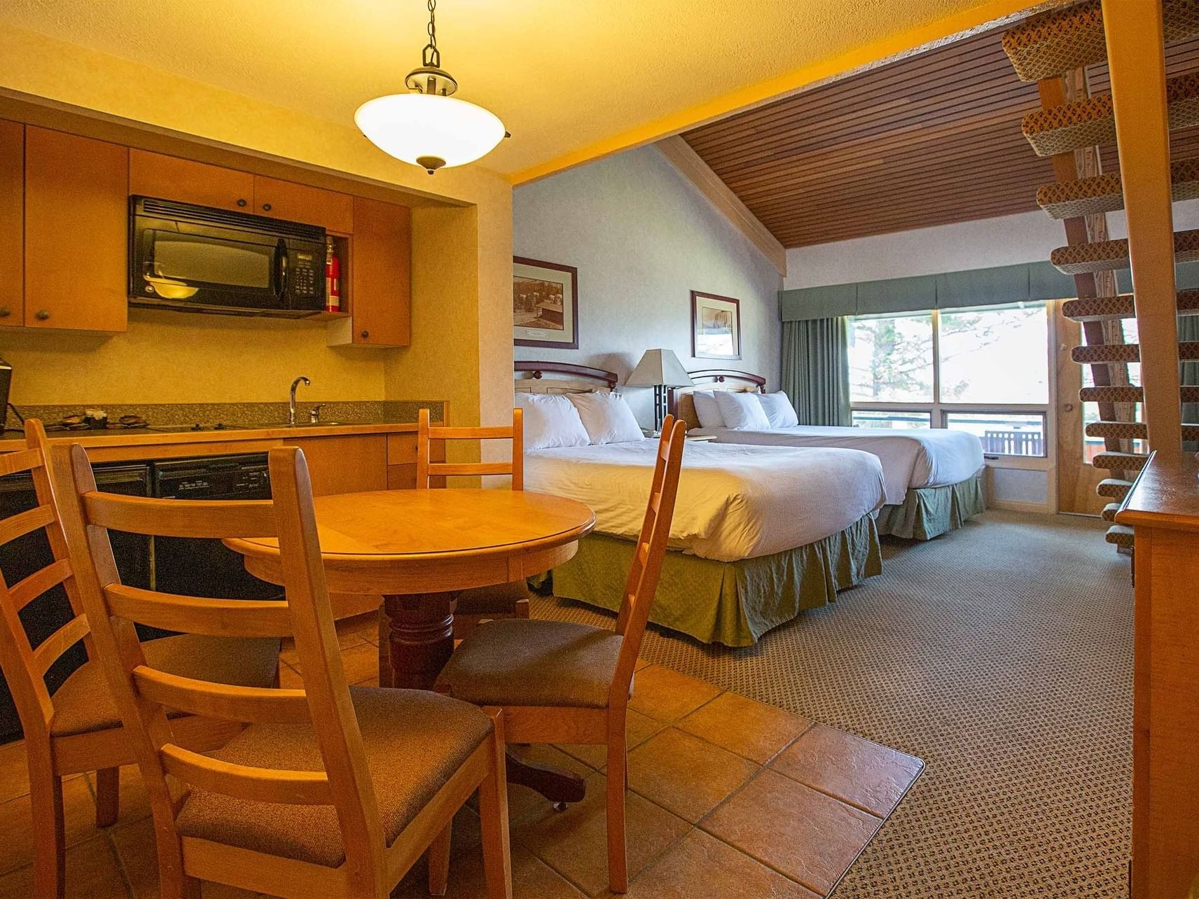 Dining table in Classic 2 Queen with Kitchenette at Fairmont Hot Springs Resort