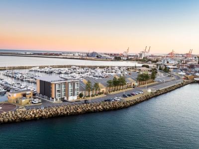 Aerial view of the Be Fremantle apartments by the ocean