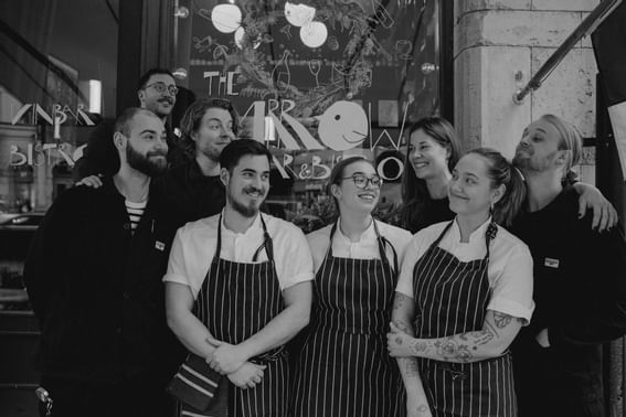 A group photo of the kitchen staff at The Sparrow Hotel