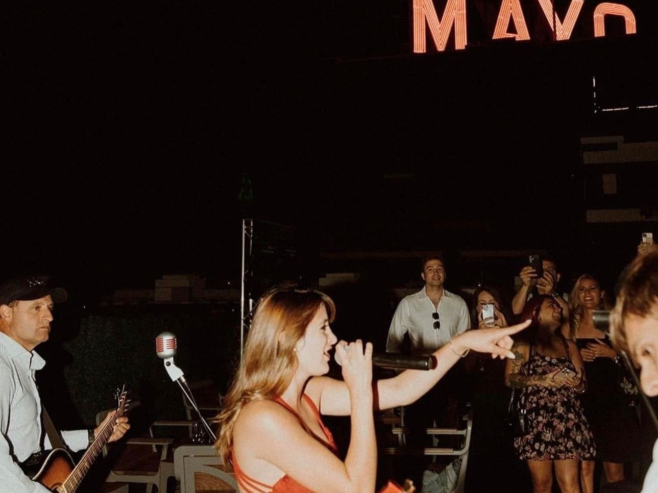 Band performing in Penthouse Rooftop Bar at The Mayo Hotel