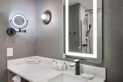 Interior of a bathroom at Sandman Signature Fort Worth Downtown