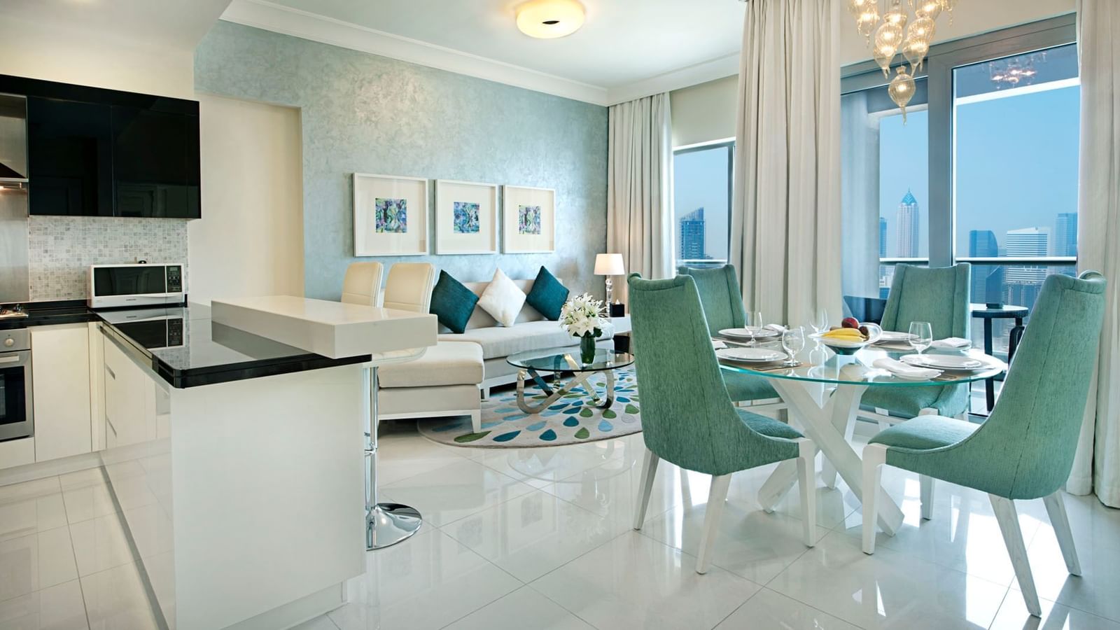 Lounge area and dining table in One Bedroom Suite at DAMAC  Maison Dubai Mall Street