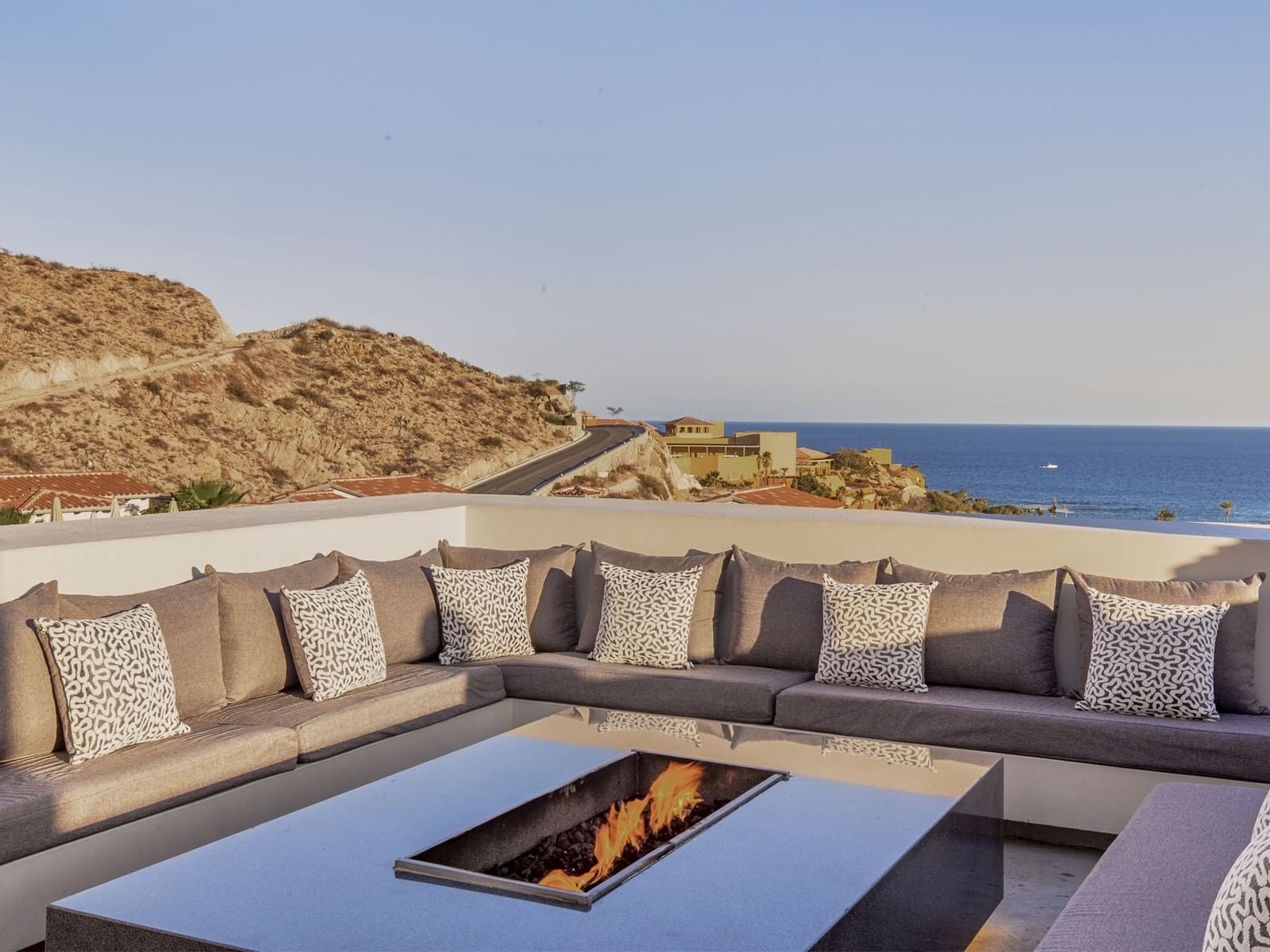 Sky bar outdoor seating patio with a fire pit, La Colección