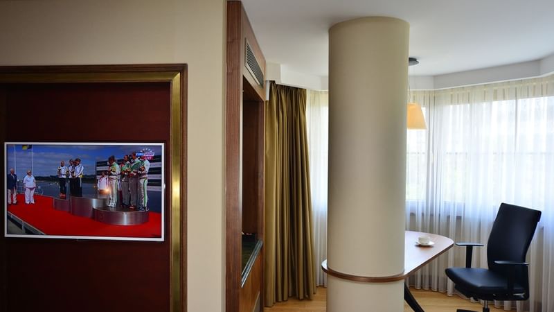 Working desk and a chair in the Executive Room at Warwick Ankara