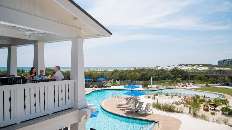 Exterior view of the balcony and pool at Watersound Inn