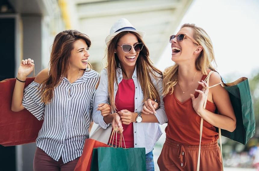Women laughing enjoying while shopping at The Exeter Inn