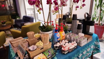Coffee bar amenities on a table in lobby at Stay Hotel Waikiki