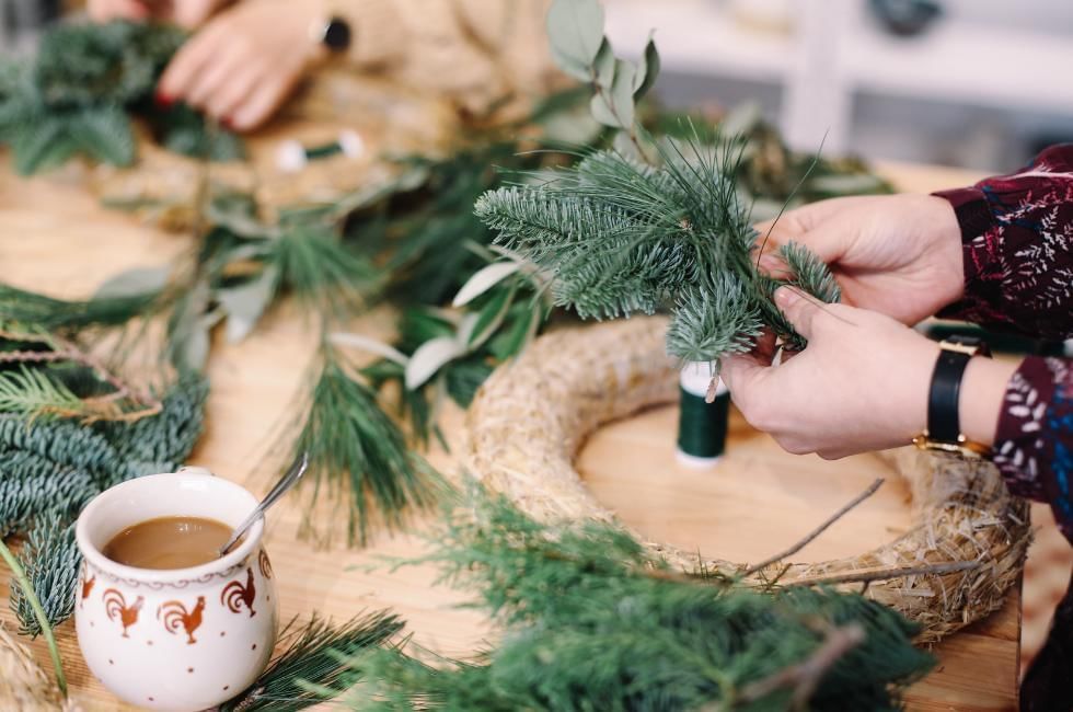 Christmas Wreath Making Workshop in Buckingham featuring greenery and a plain wreath base