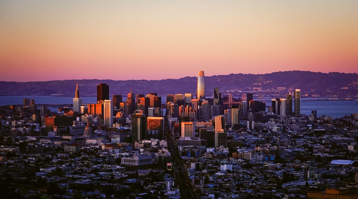San Francisco city view by the bay under a pink sunset sky near the hills near Warwick San Francisco