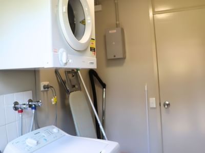 Laundry room with washing machine and dryer at La Trobe University - Villas.