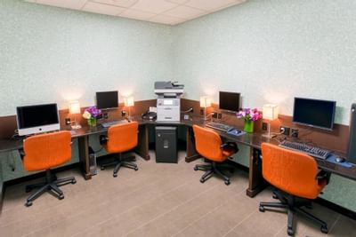 Close-up of computer tables in Business Center at Kinzie Hotel