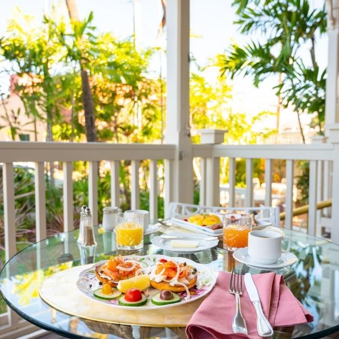 Close-up of breakfast served on the terrace at Plantation Inn