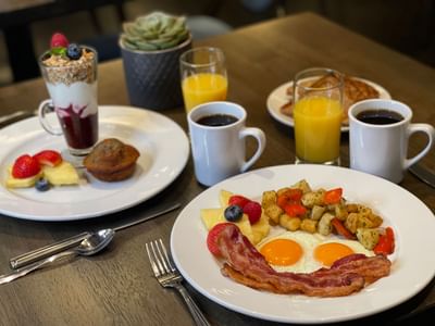 Breakfast spread with coffee & fresh juice served at The St. Regis Hotel featuring FREE hotel breakfast Vancouver