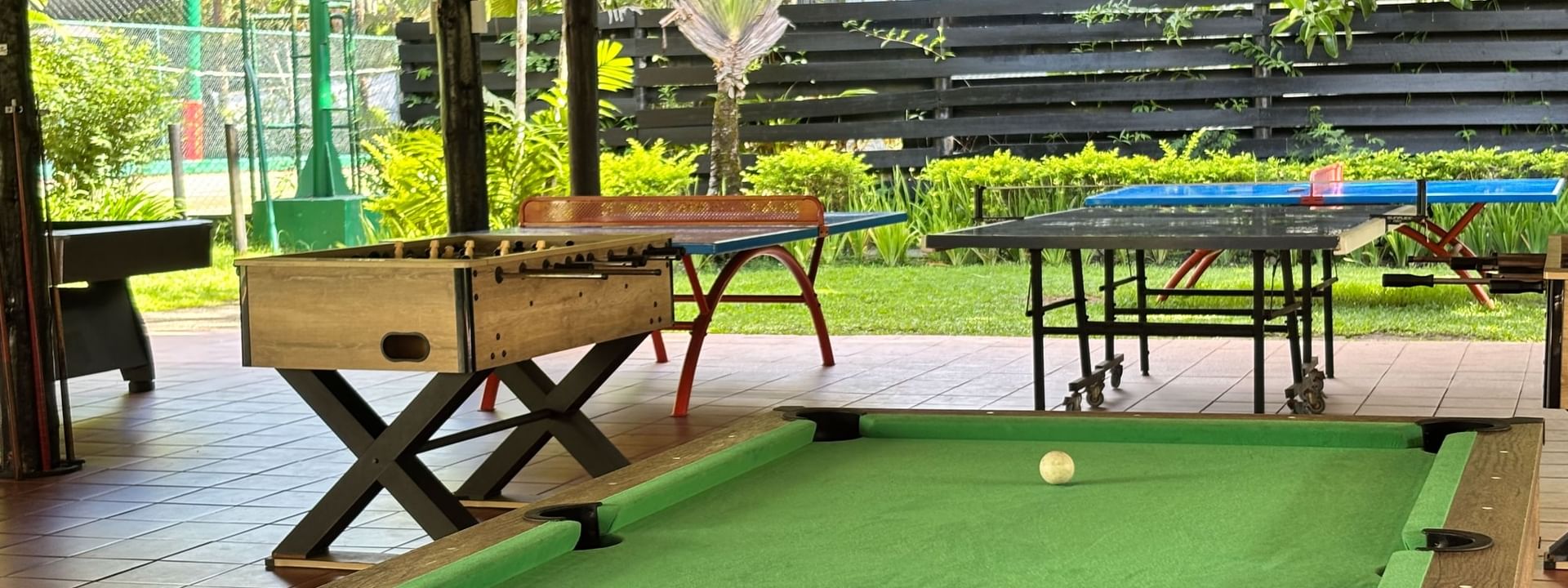Pool and foosball tables set up outdoors at Warwick Fiji Resort and Spa, Korolevu