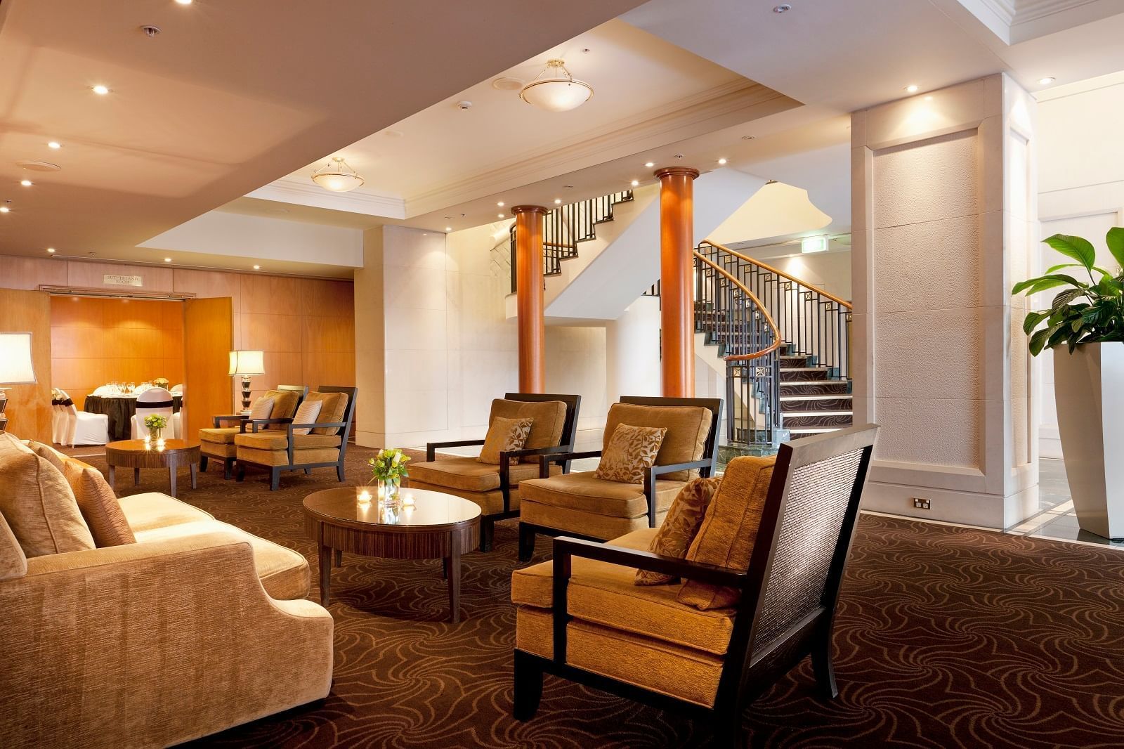 Lounge area at The Sebel Quay West Suites Auckland