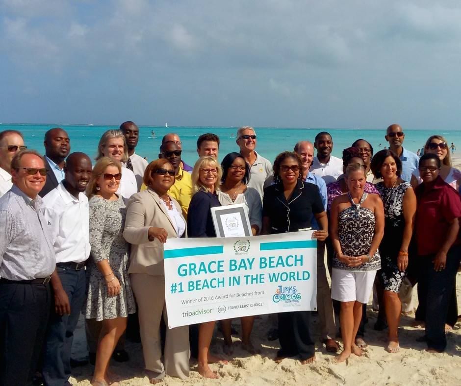 People posing for a picture at The Somerset On Grace Bay
