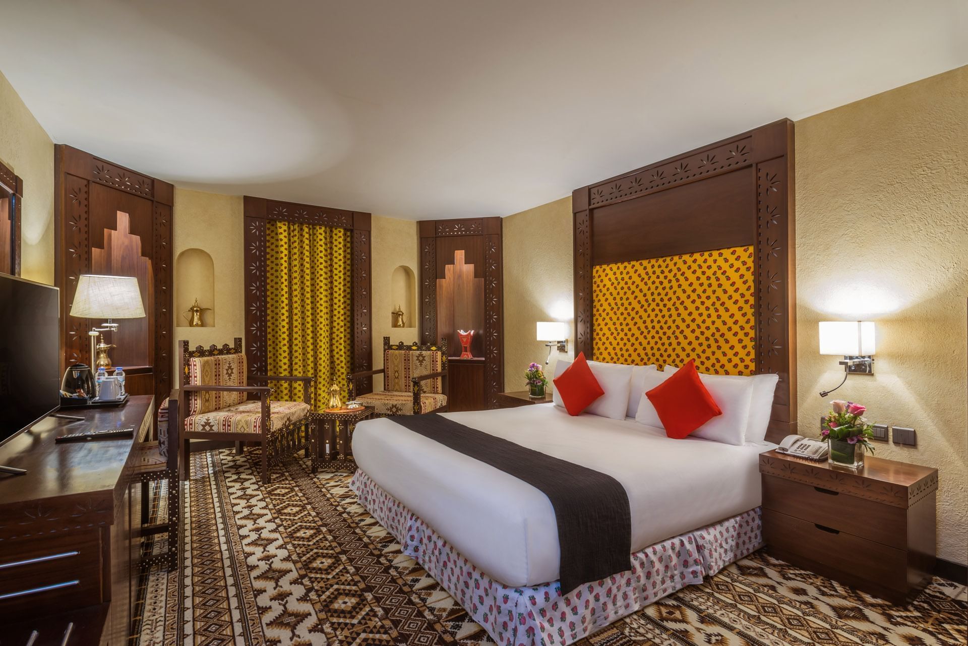 TV & king size bed in Deluxe king Suite at Mena Andalusia Hotel
