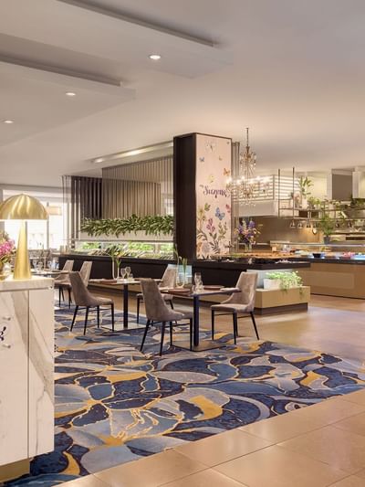 Modern hotel buffet area with elegant furniture in Suzette at Sofitel Brisbane Central