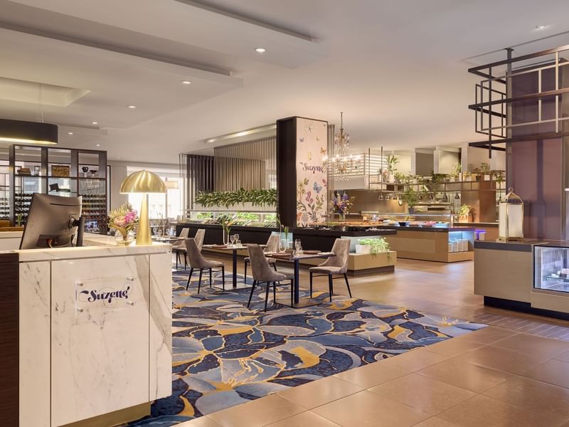 Modern hotel buffet area with elegant furniture in Suzette at Sofitel Brisbane Central