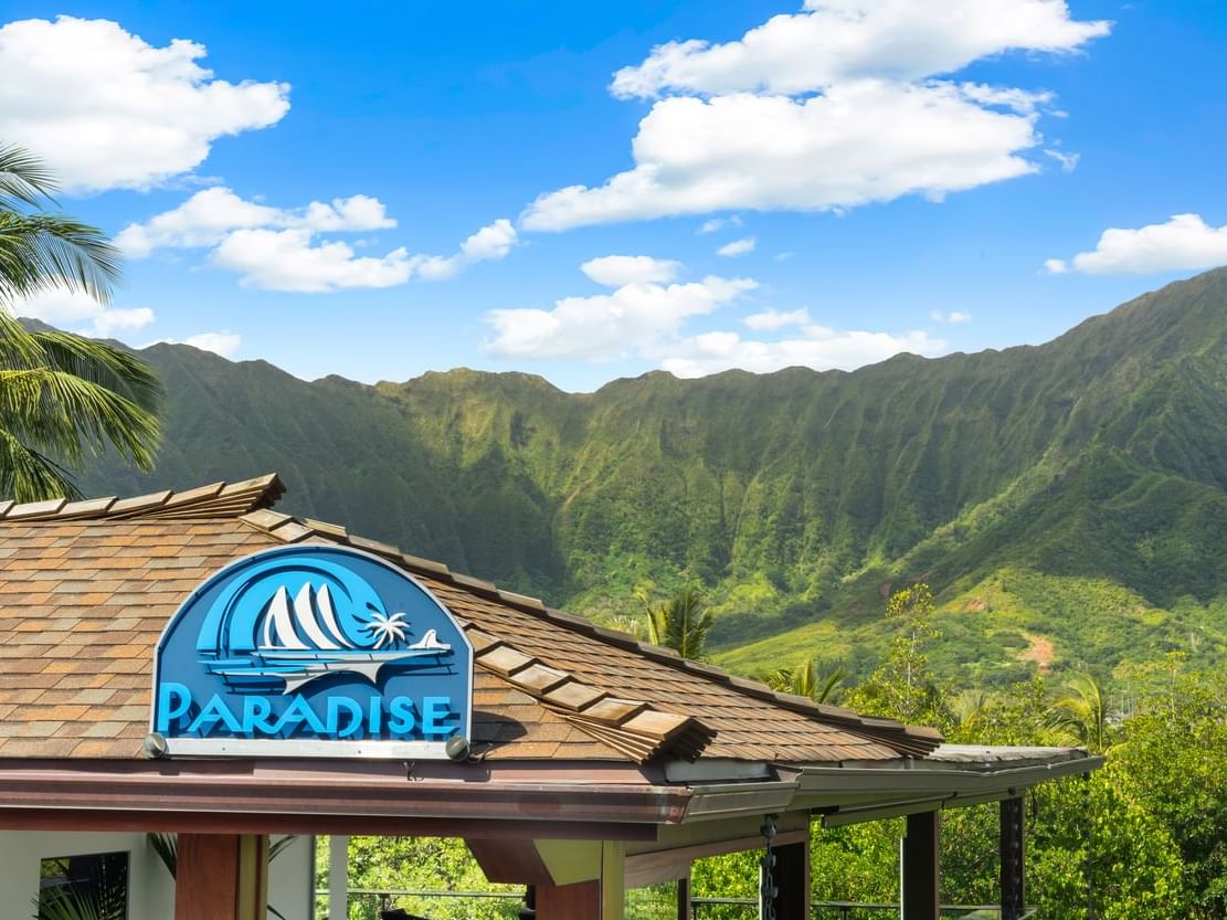 High angle view of the hotel entrance & sign board at Paradise Bay Resort