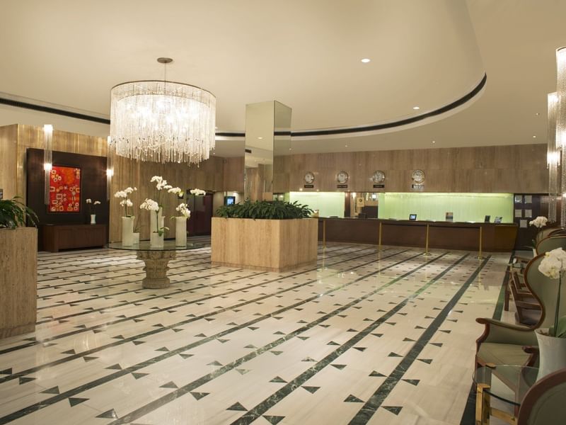 Lobby area with modern chandeliers at FA Reforma