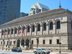 cars parked in front of the Boston Public Library