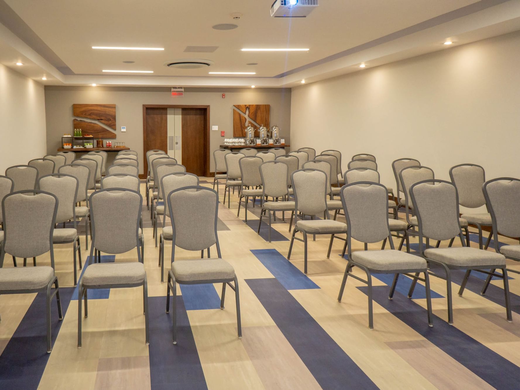 Theatre-type chair arrangements in the Coral Meeting room at Fiesta Resort