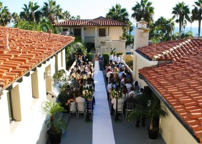 ceremony site with ocean views and guests