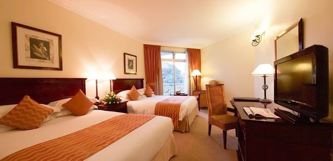 Two Queen beds at the family Room at Lake Kivu Serena Hotel