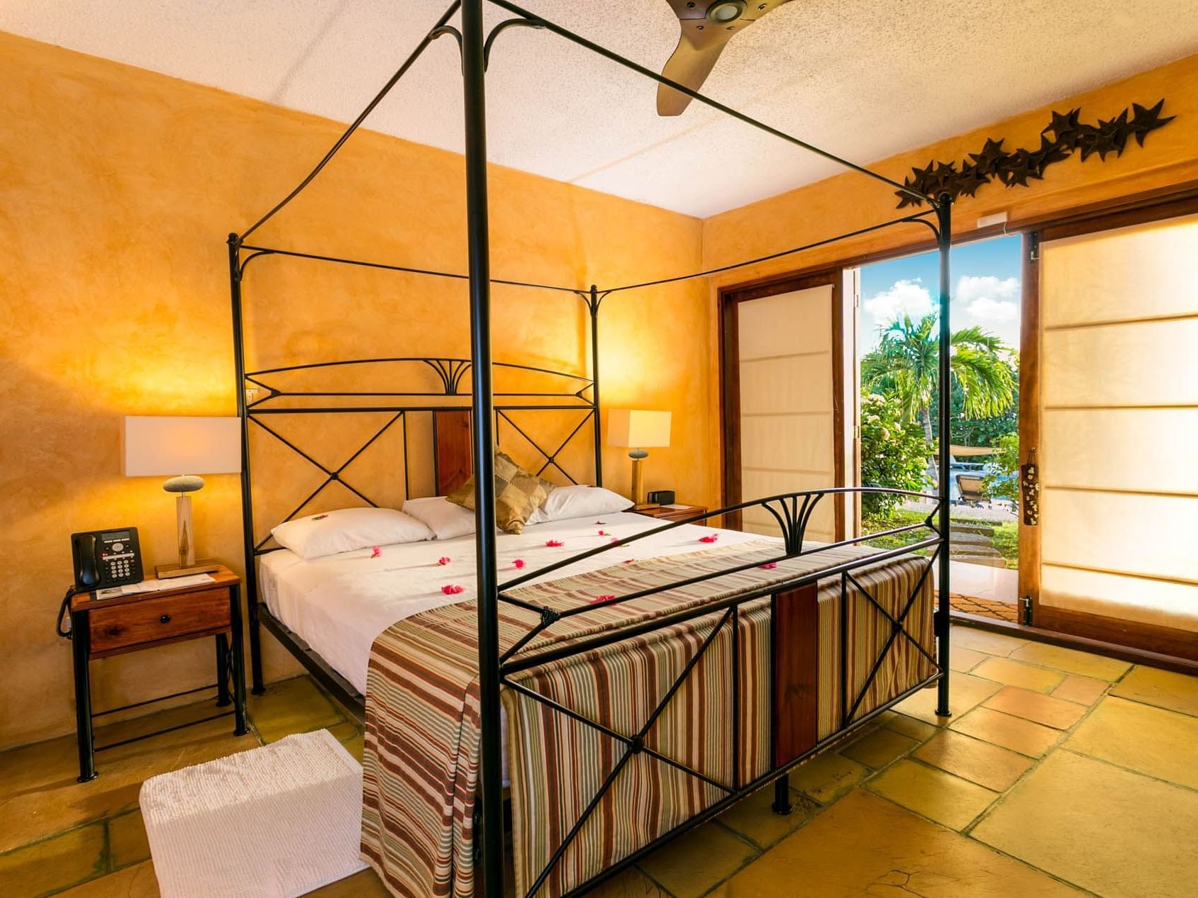 Bedroom arrangement in a Villa at True Blue Bay Resort