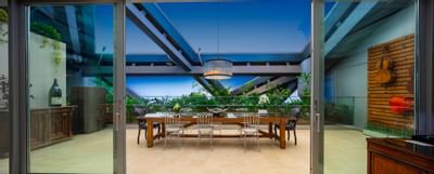 Suites room with a table setup for event at Hotel Eclat Beijing