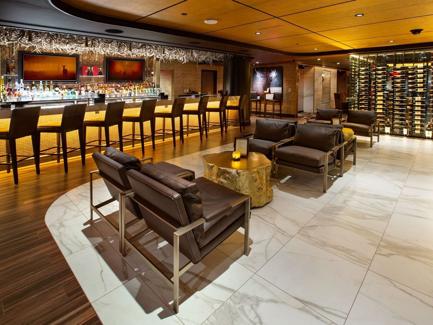 chairs next to a bar area