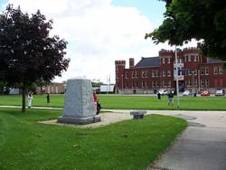 Wide view of people enjoying in Tecumseh Park near Retro Suites Hotel