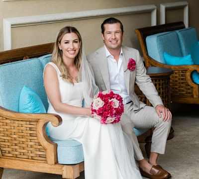 Wedding couple posing at The Somerset on Grace Bay