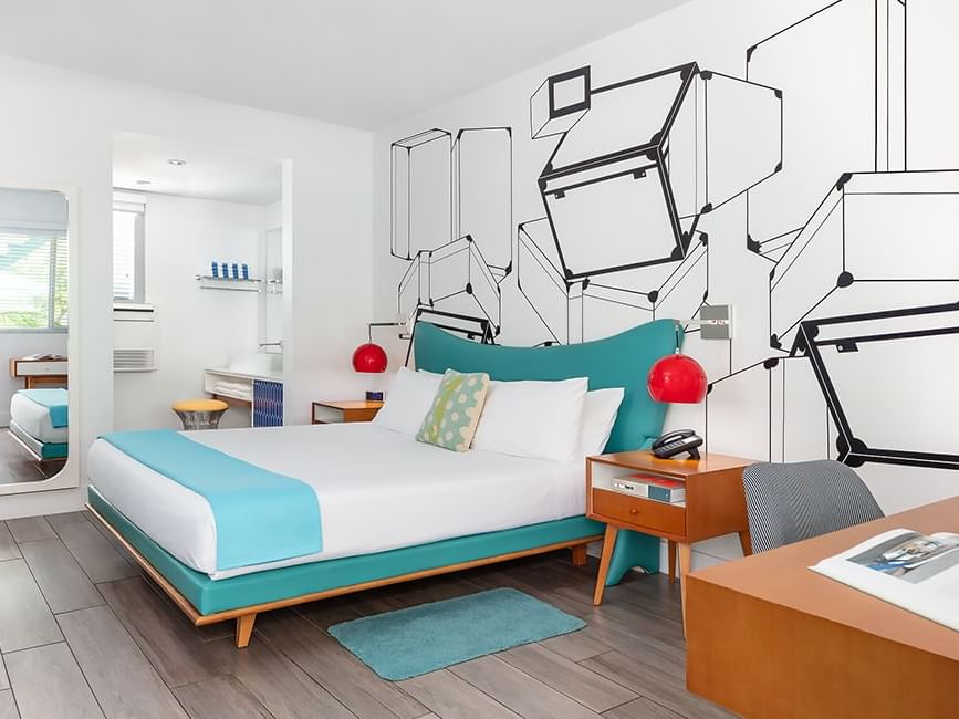 Galaxie King  room at  Vagabond Hotel Miami: Mid-century Modern design with king-size bed, bedside tables, wall lamps & desk