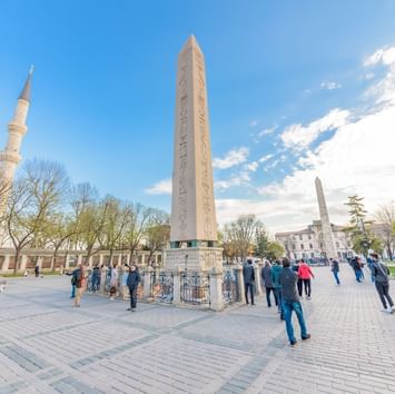 Exterior view of the tower Obelisk of Theodosius on a sunny day near Titanic Business Kartal