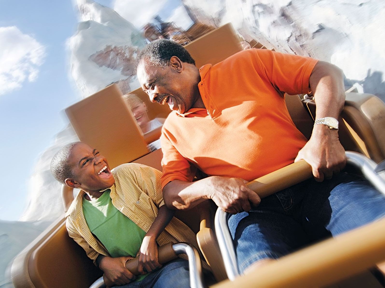 Father & son on a rollercoaster near Rosen Inn Lake Buena Vista